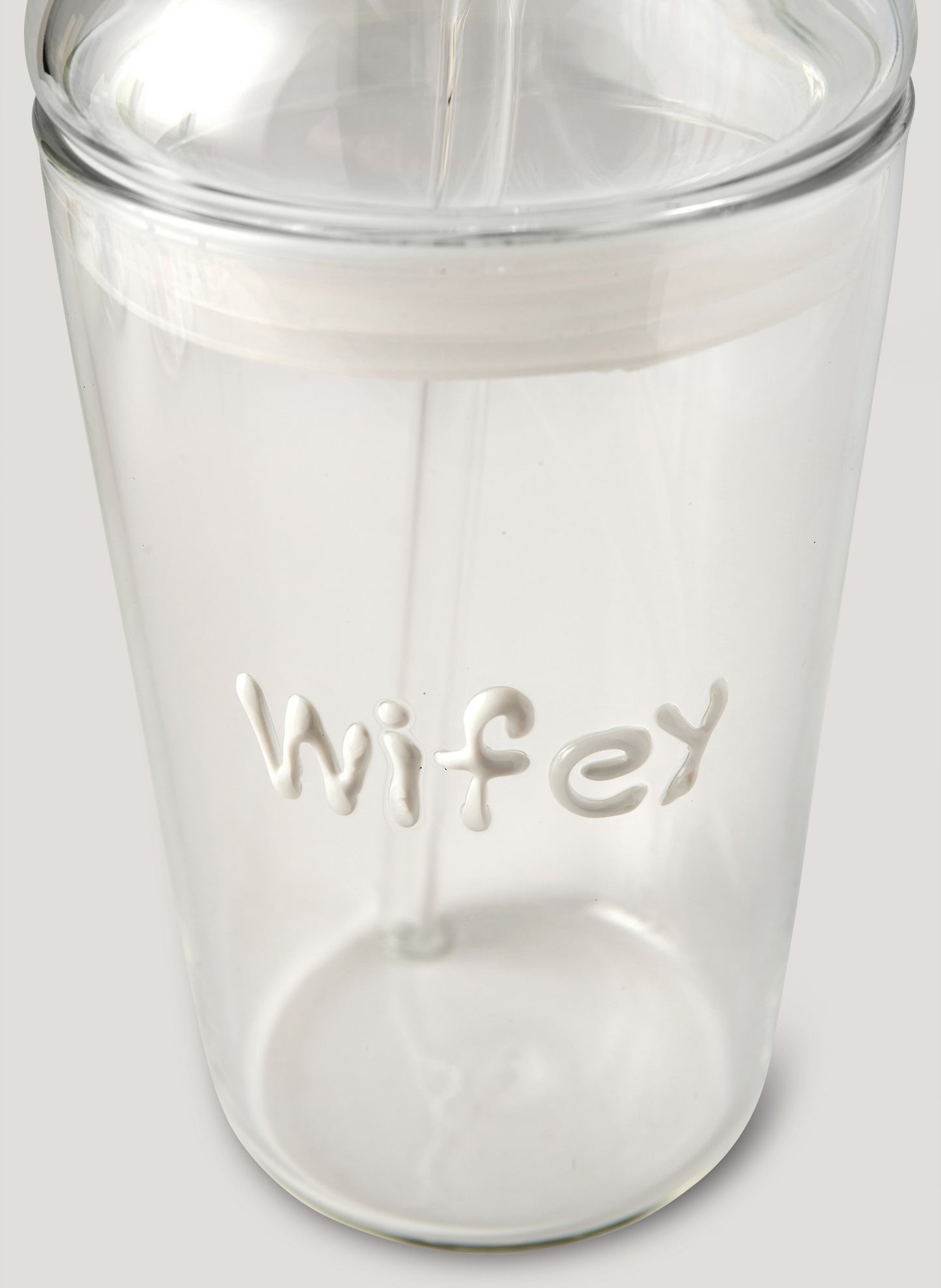 Clear tumbler with 'wifey' engraving on a white background