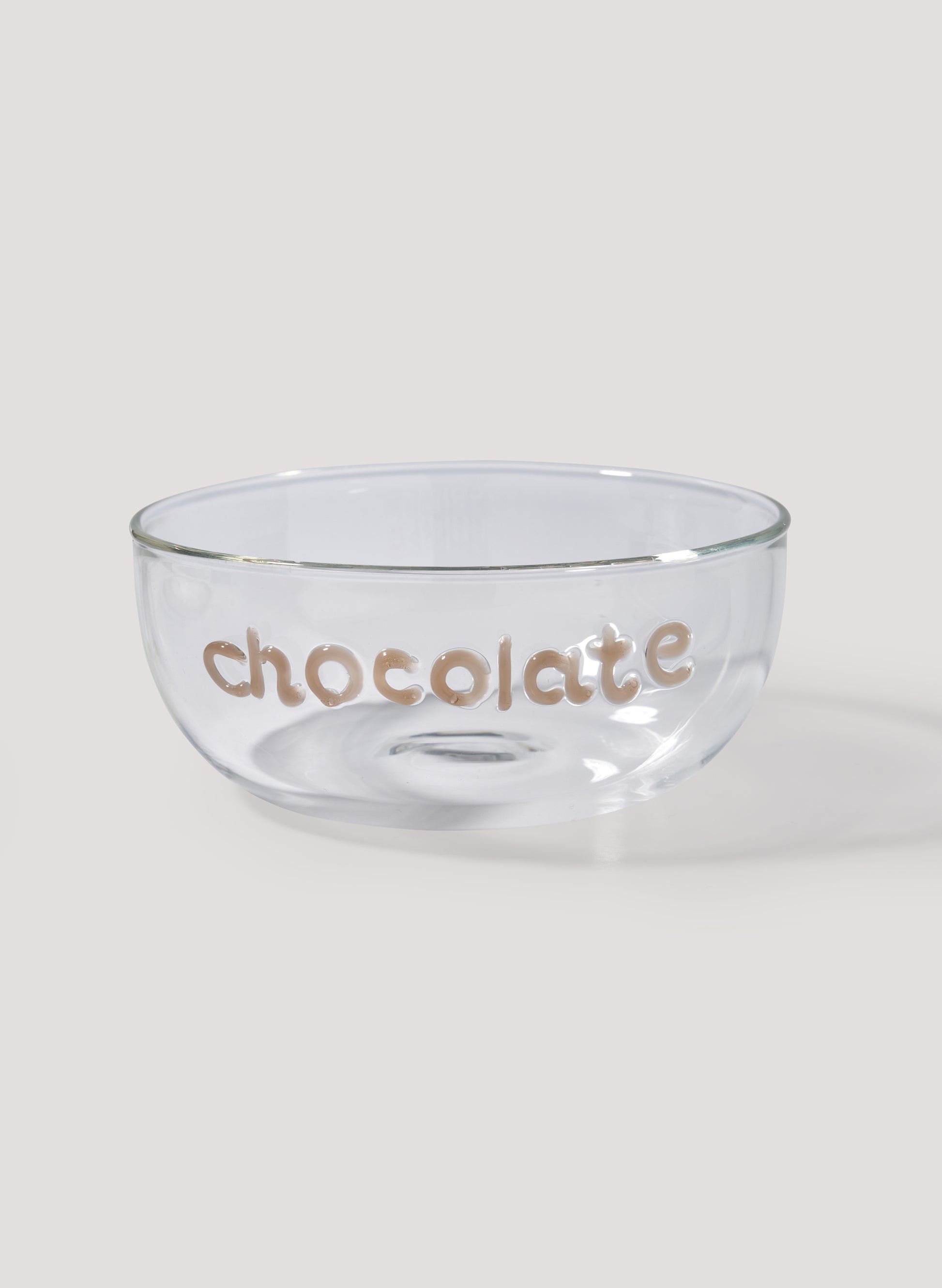 Clear glass bowl with 'chocolate' text on a white background