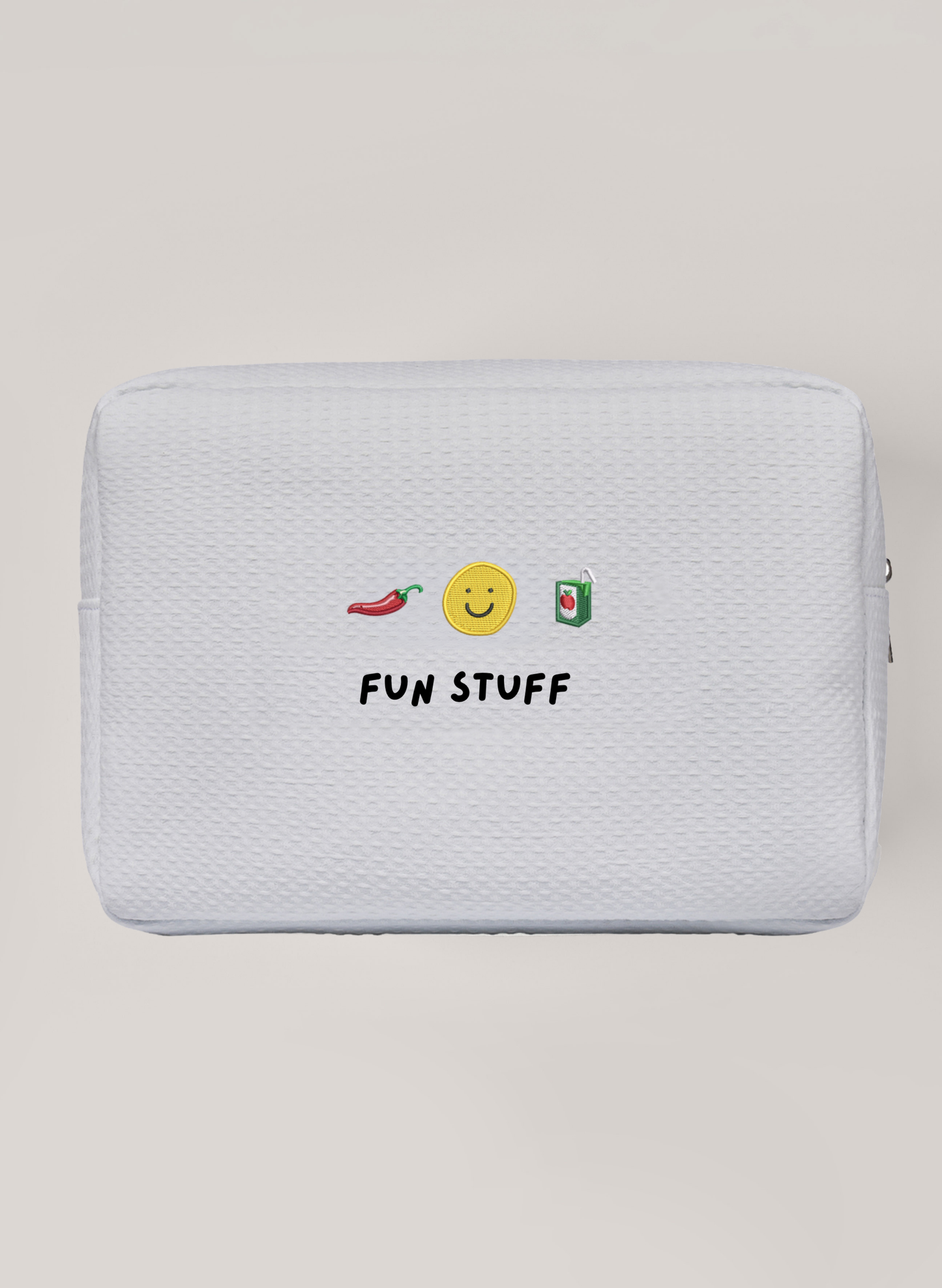 White Waffle pouch with embroidered icons and 'FUN STUFF' text on a beige background