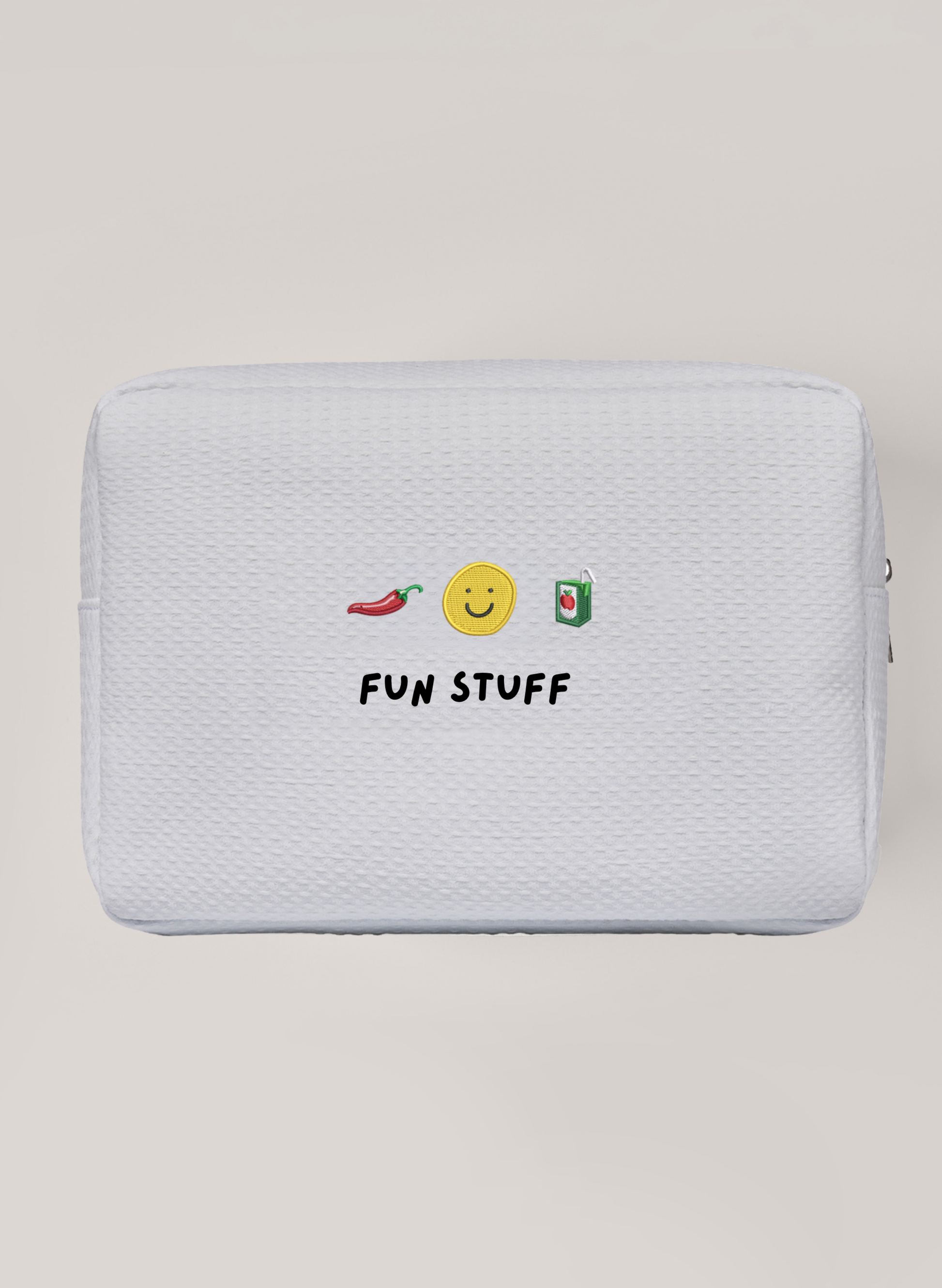 White Waffle pouch with embroidered icons and 'FUN STUFF' text on a beige background