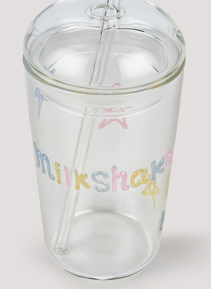 Clear tumbler with colorful 'milkshake' text on a white background