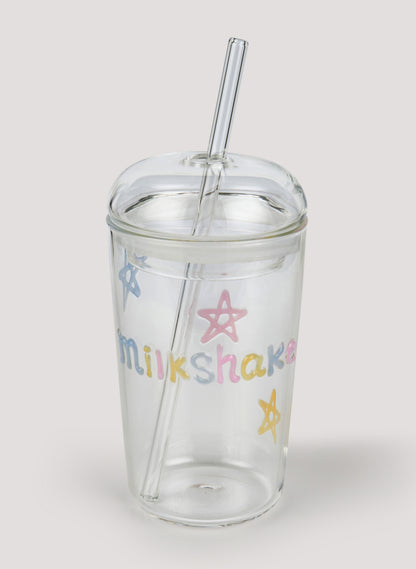 Clear tumbler with colorful 'milkshake' text and star designs on a white background