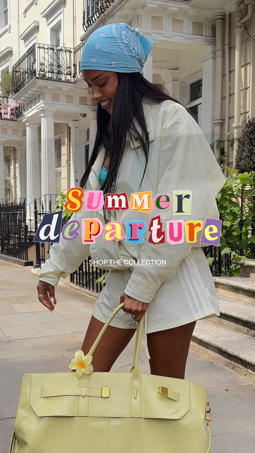 A woman walking on a city street wearing a light blue patterned bandana, a white oversized shirt, and white shorts, while carrying a large pale yellow leather tote bag. The image has a colorful 'Summer departure' text overlay.