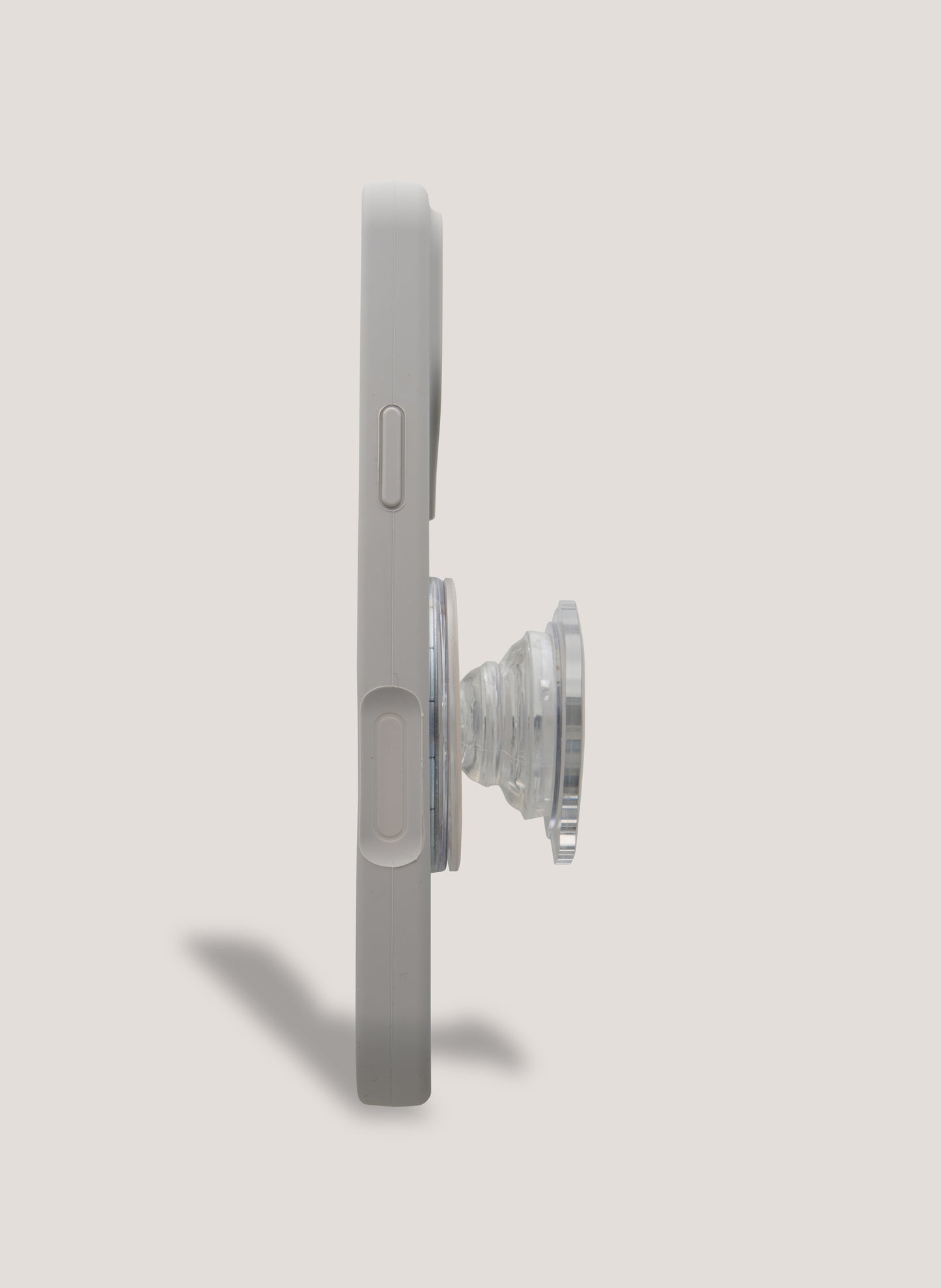 Phone case with a pop socket on a light gray background