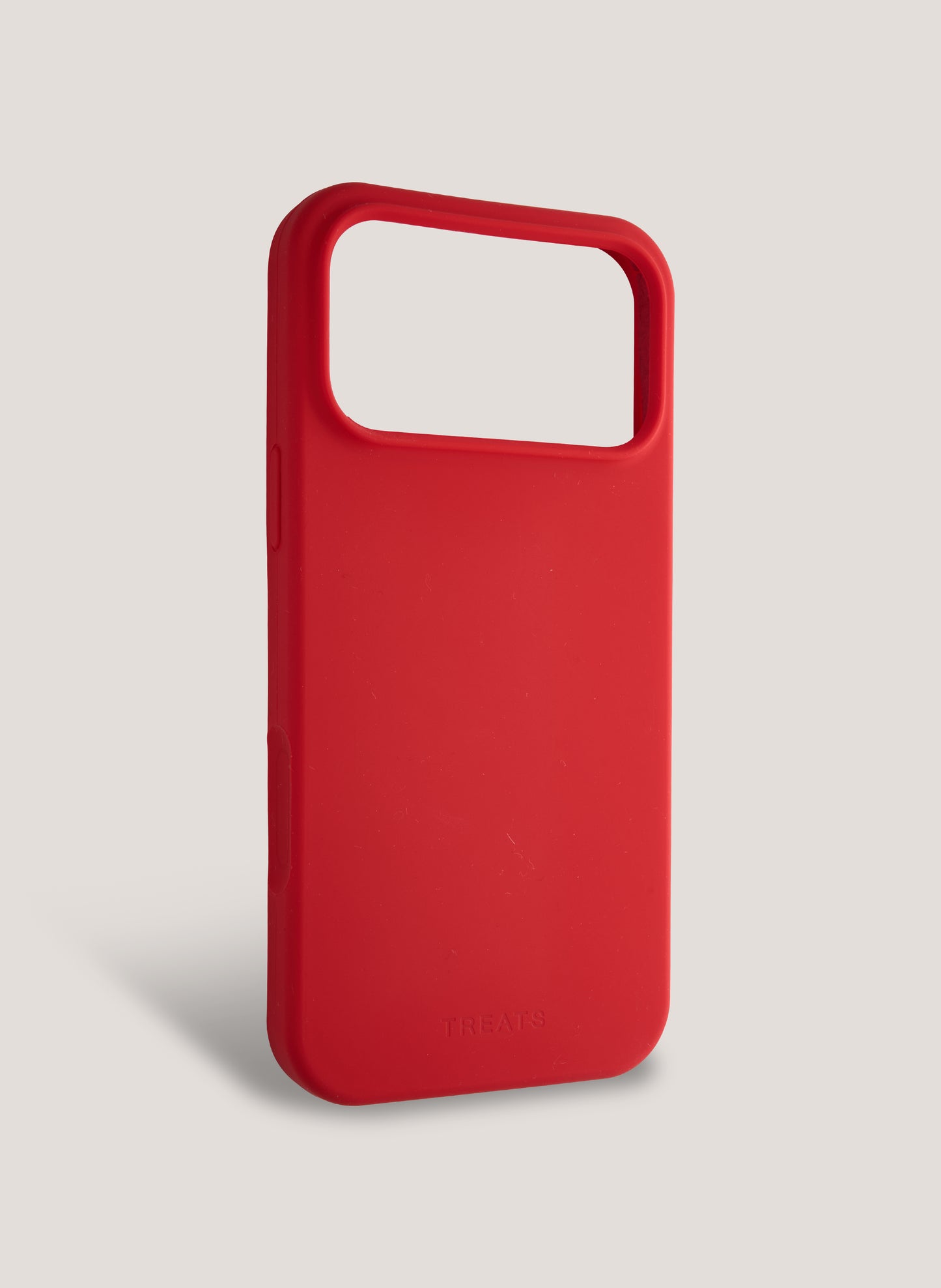 Red phone case with a minimal design on a light gray background