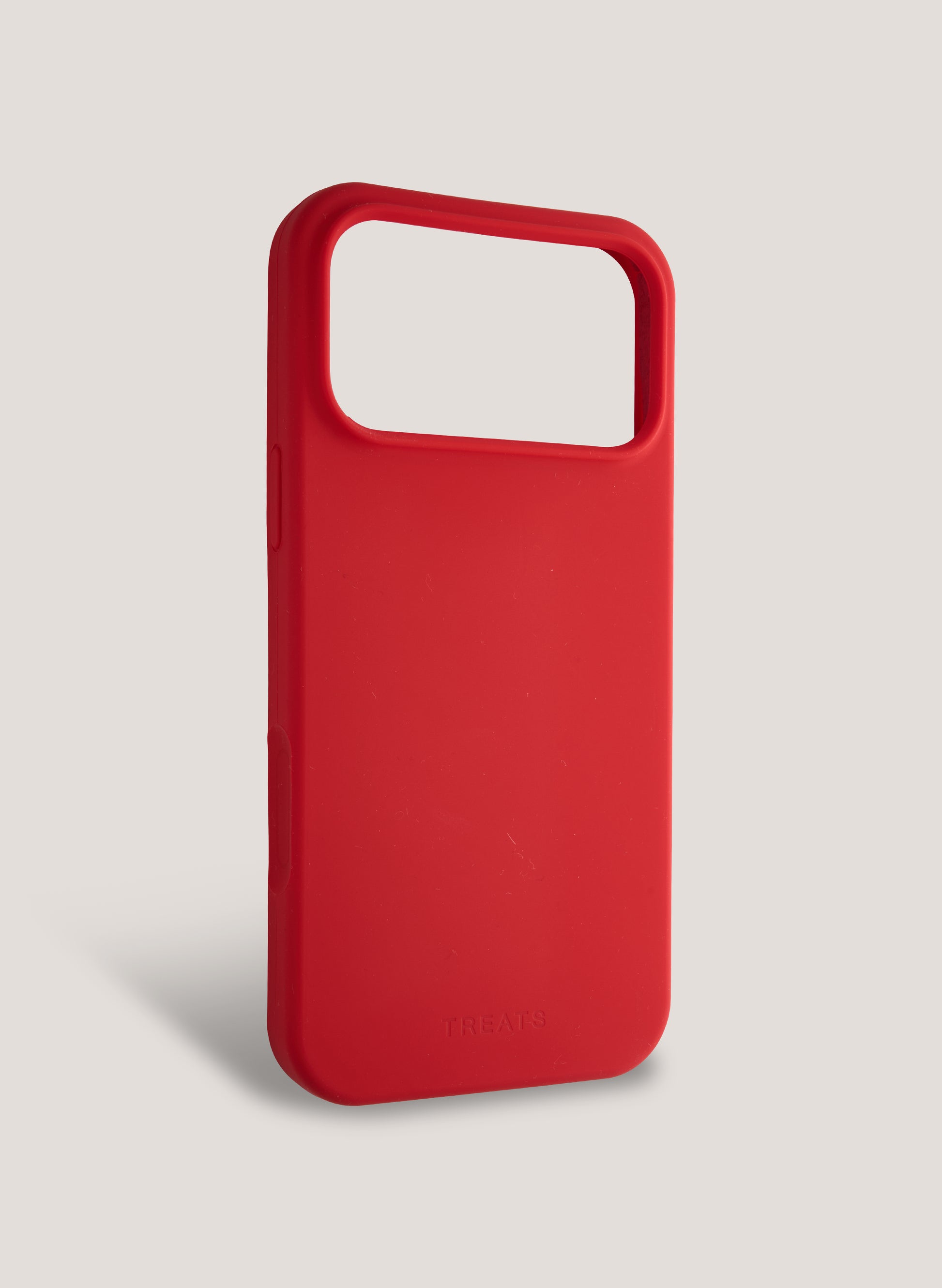Red phone case with a minimal design on a light gray background