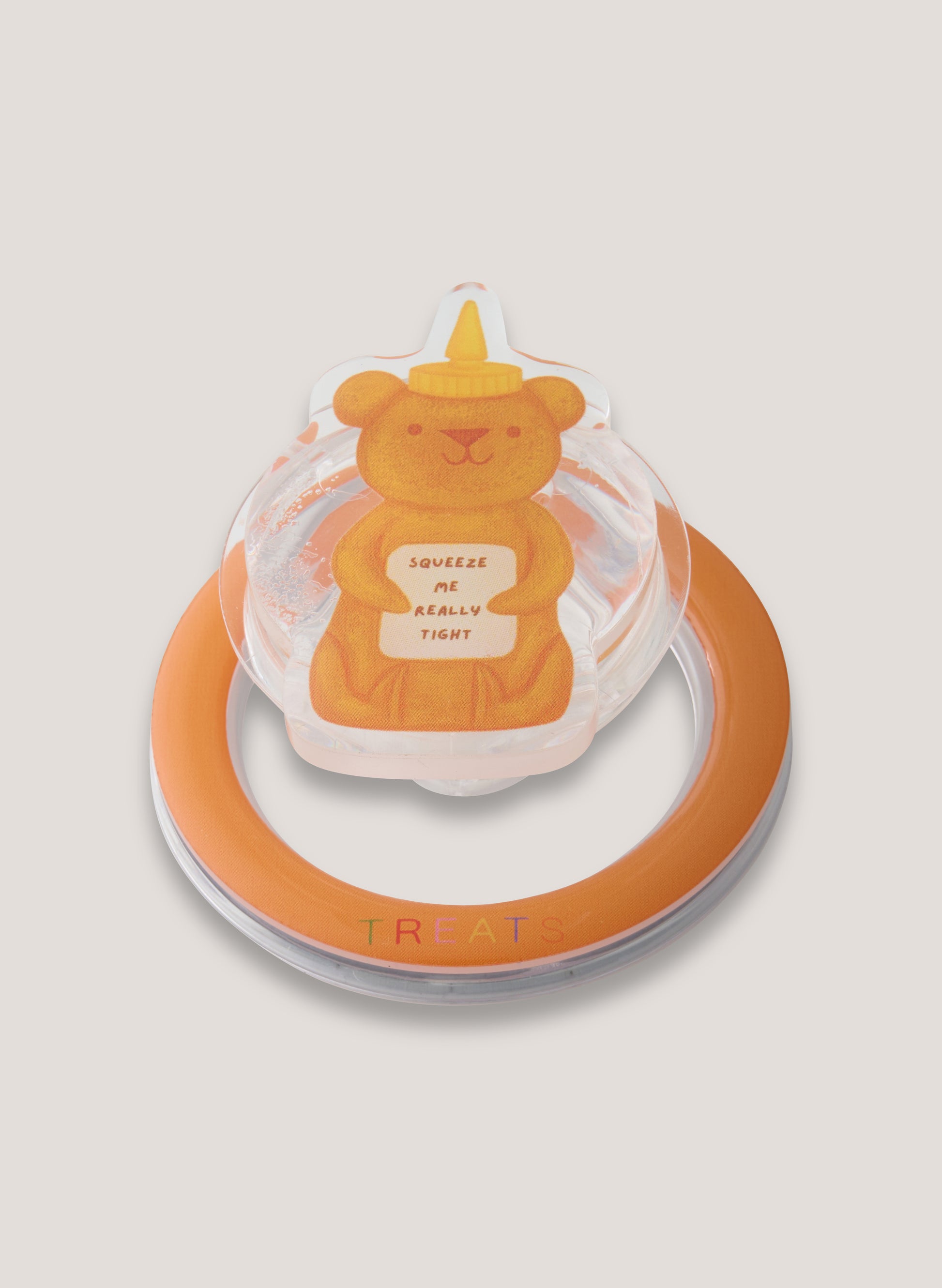 Phone pop socket with bear design and orange lid on a light grey background