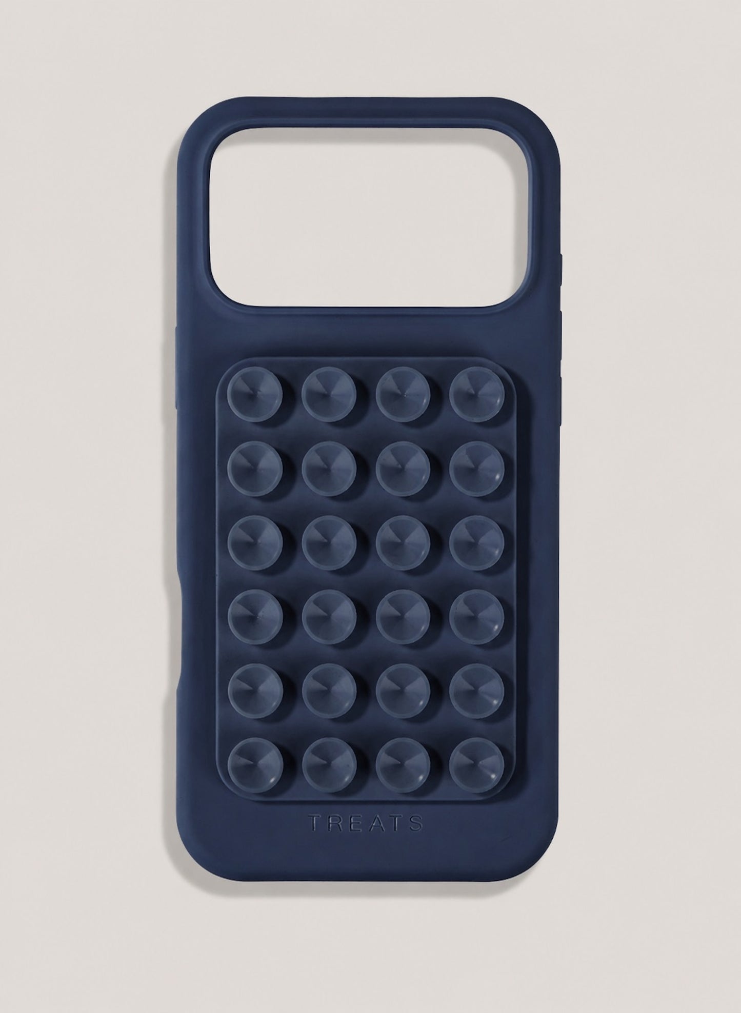 Navy blue phone case with suction cups on a light grey background