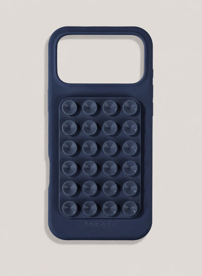 Navy blue phone case with suction cups on a light grey background