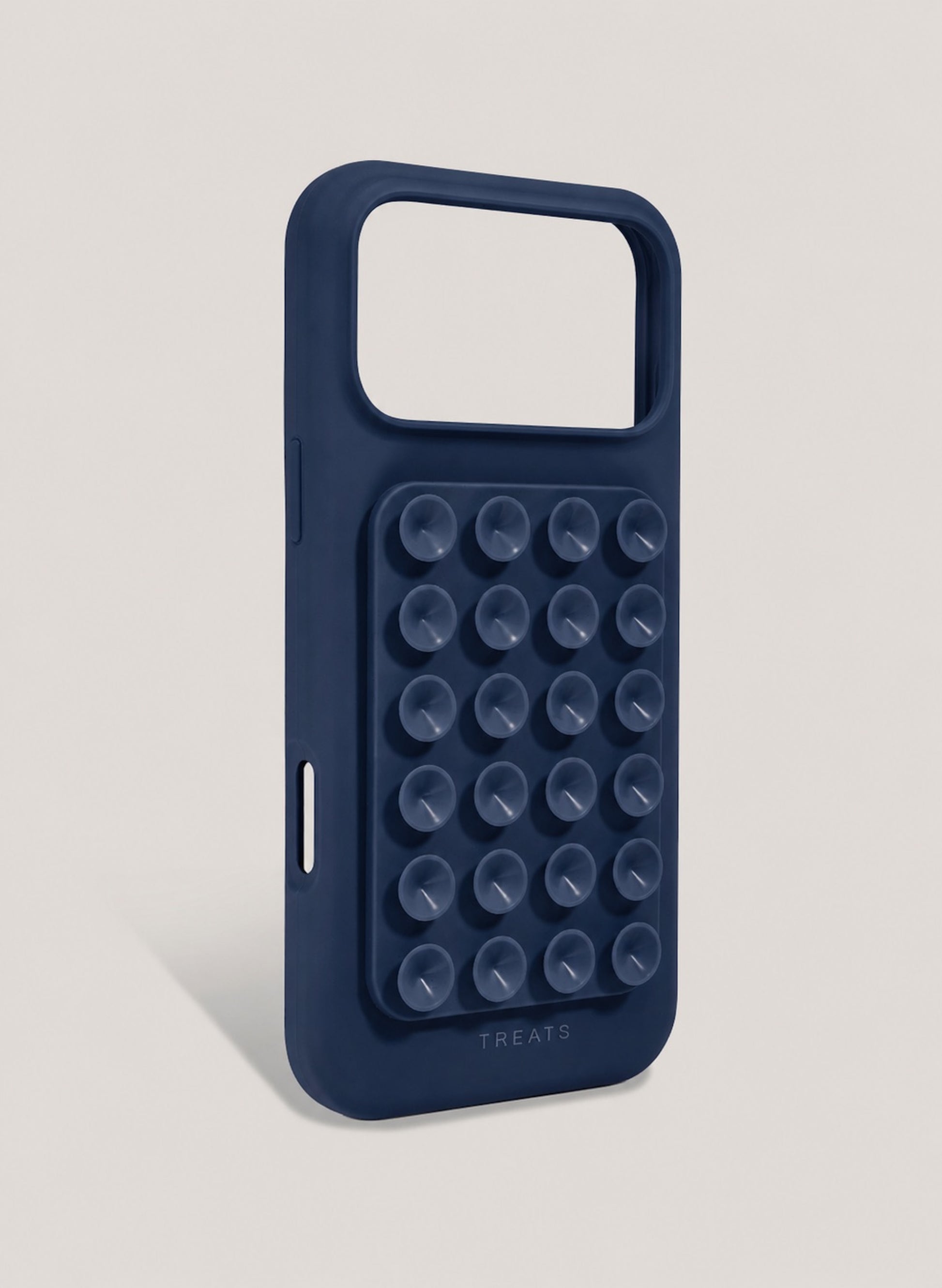 Navy blue phone case with suction cups on a light grey background