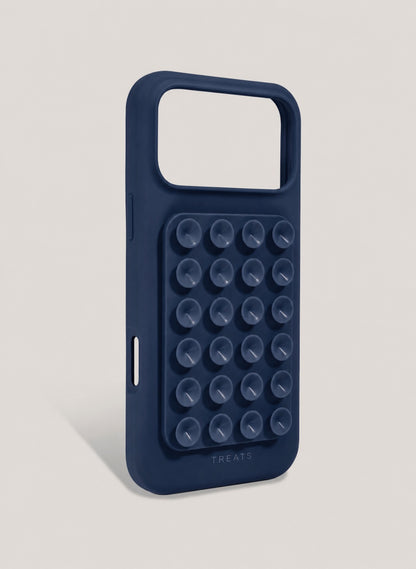 Navy blue phone case with suction cups on a light grey background