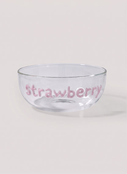 Clear glass bowl with 'Strawberry' text on a white background