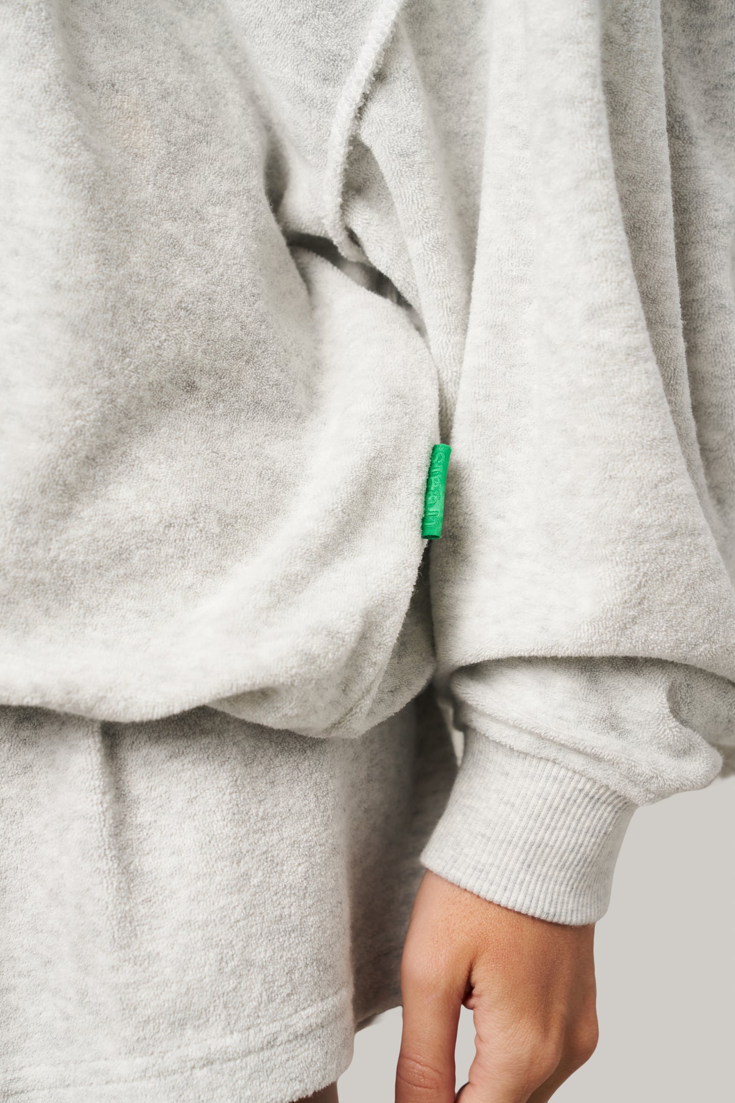 Grey short set with green tag