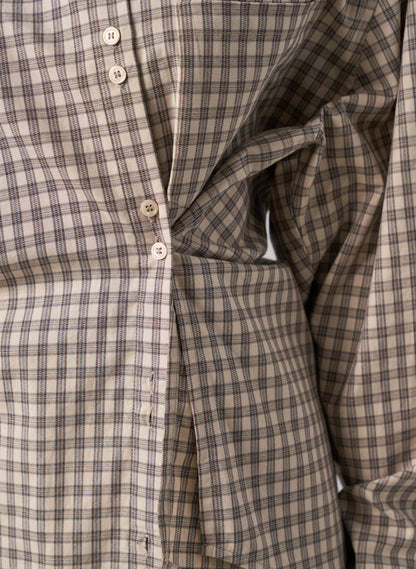 Close-up of a plaid shirt with buttons