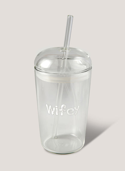 Clear tumbler with 'Wifey' text and straw on a light grey background